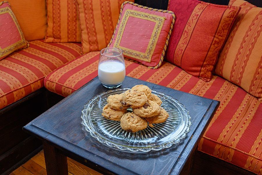 Cookies and milk set out in the living room at Oakland Cottage