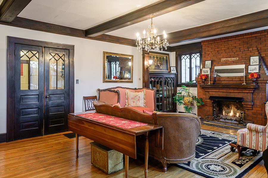 The living room at Oakland Cottage with its original fireplace