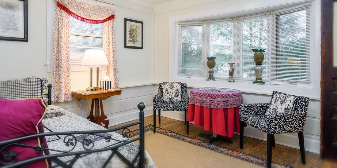 The sitting room of the Magnolia Suite with its bay window