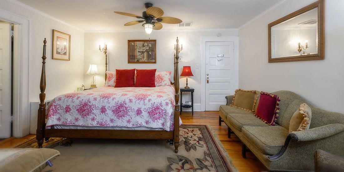 Magnolia Suite at Oakland Cottage, four poster king bed